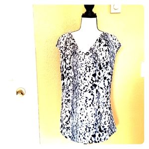 Animal print swoop neck blouse.